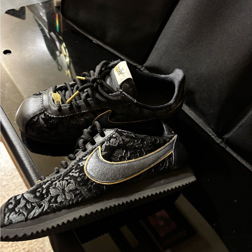 Nike Black and Gold Textured Sneakers